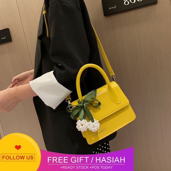 designer bags bag2022 summer new korean women's fashion one shoulder ribbon pearl handheld crossbody small square
designer bags bag2022 summer new korean women's fashion one shoulder ribbon pearl handheld crossbody small square