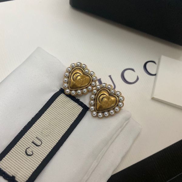 brand designer orecchini earring women stud luxury gold heart shape pearl crystal gold double g letter 925s silver jewelry, Golden;silver
brand designer orecchini earring women stud luxury gold heart shape pearl crystal gold double g letter 925s silver jewelry, Golden;silver