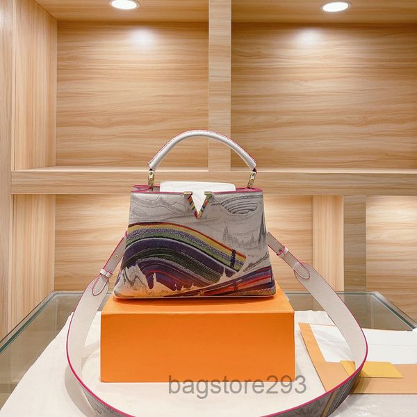 a women capucines handbag lady tote crossbody designer bag colorful painting litchee genuine leather handbags fashion letter flap handcraft
a women capucines handbag lady tote crossbody designer bag colorful painting litchee genuine leather handbags fashion letter flap handcraft