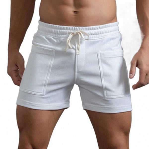 men's shorts mens summer solid color big pockets pants pocket drawstring loose casual sports running straight beach sport short menmen&, White;black
men's shorts mens summer solid color big pockets pants pocket drawstring loose casual sports running straight beach sport short menmen&, White;black