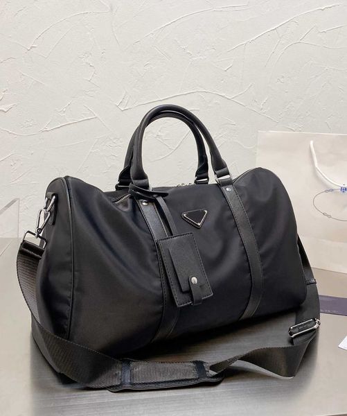 large capacity men fashion duffle bag triple black nylon travel bags mens handle luggage gentleman business tote with shoulder strap
large capacity men fashion duffle bag triple black nylon travel bags mens handle luggage gentleman business tote with shoulder strap