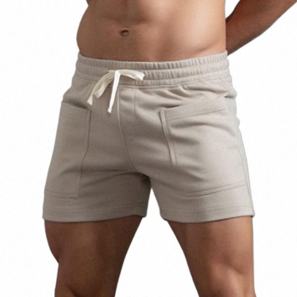 men's shorts mens summer solid color big pockets pants pocket drawstring loose casual sports running slippers for girls mediummen', White;black
men's shorts mens summer solid color big pockets pants pocket drawstring loose casual sports running slippers for girls mediummen', White;black