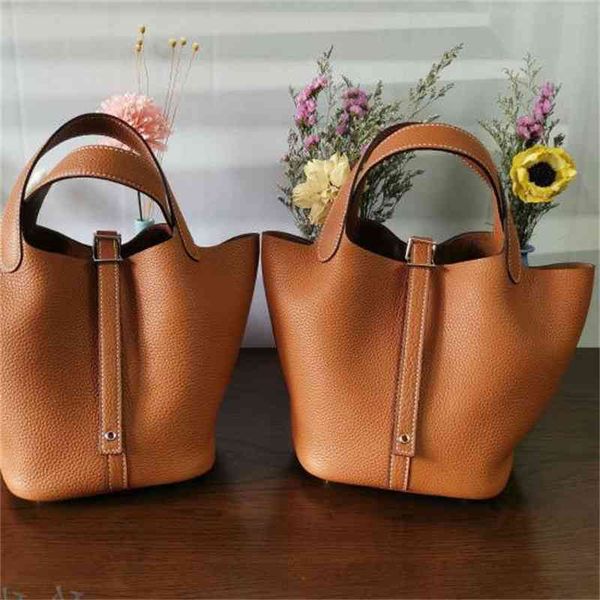 fashion women's bags vegetable basket children's bun cow leather new korean mother's portable bu et bride's wedding
fashion women's bags vegetable basket children's bun cow leather new korean mother's portable bu et bride's wedding