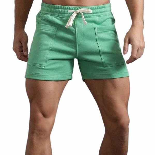 men's shorts mens summer solid color big pockets pants pocket drawstring loose casual sports running straight beach indoor boymen', White;black
men's shorts mens summer solid color big pockets pants pocket drawstring loose casual sports running straight beach indoor boymen', White;black