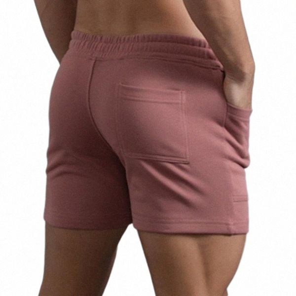 men's shorts mens summer solid color big pockets pants pocket drawstring loose casual sports running straight beach men 11 inchmen', White;black
men's shorts mens summer solid color big pockets pants pocket drawstring loose casual sports running straight beach men 11 inchmen', White;black