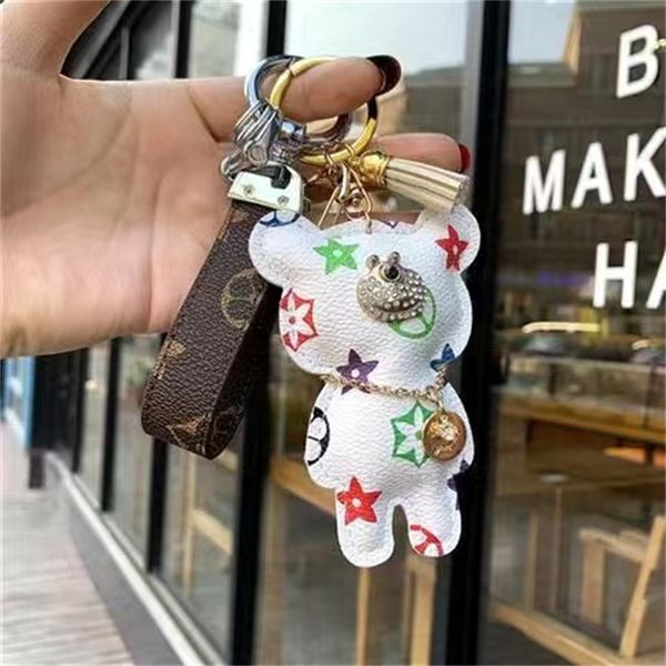 fashion keychain luxury designer stylish sun-flower doll pendant keychains three colors keys buckle mens womens keys ornaments high quality, Silver
fashion keychain luxury designer stylish sun-flower doll pendant keychains three colors keys buckle mens womens keys ornaments high quality, Silver