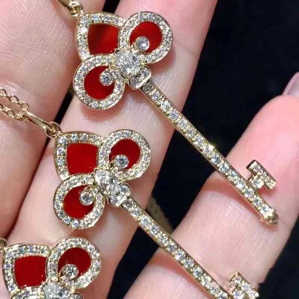 dhl t's spring key necklace 925 sterling silver plated 18k gold qianxi the same red chalcedony iris key pendant
dhl t's spring key necklace 925 sterling silver plated 18k gold qianxi the same red chalcedony iris key pendant