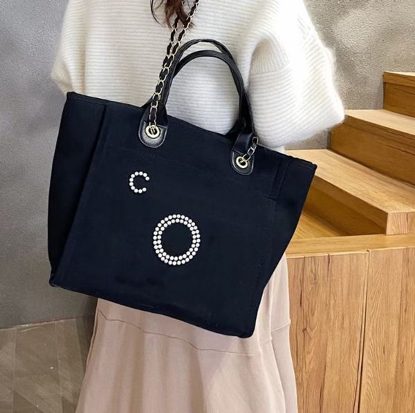 deisgners women's canvas pearl handbags high-capacity one-shoulders tote bags beige black leather chain ladies document o
deisgners women's canvas pearl handbags high-capacity one-shoulders tote bags beige black leather chain ladies document o