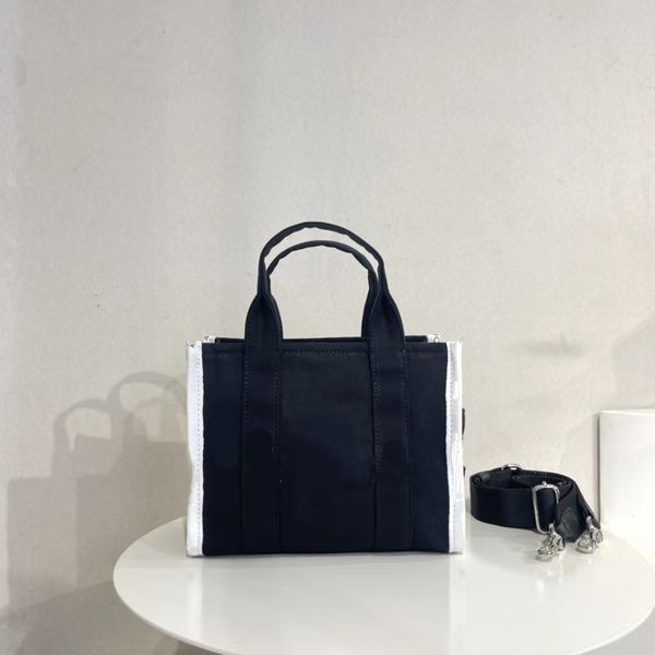 totes marc tote bag women casual canvas designer bags single shoulder diagonal trend letter leisure fashion high capacity handbag messenger
totes marc tote bag women casual canvas designer bags single shoulder diagonal trend letter leisure fashion high capacity handbag messenger