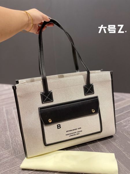 classic tote shopping bag famous handbag stripe large capacity package b letter shoulder retro temperament women bags 003
classic tote shopping bag famous handbag stripe large capacity package b letter shoulder retro temperament women bags 003