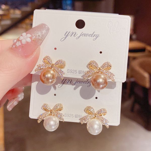 s925 silver needle stud earrings delicate micro zircon bow pearl ear studs for women's fashion simple jewelry, Golden;silver
s925 silver needle stud earrings delicate micro zircon bow pearl ear studs for women's fashion simple jewelry, Golden;silver