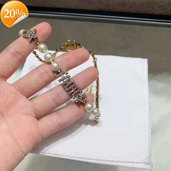 high-end fashion design women's necklace d jia di 21 year pearl net red same ja letter star diamond, Silver
high-end fashion design women's necklace d jia di 21 year pearl net red same ja letter star diamond, Silver