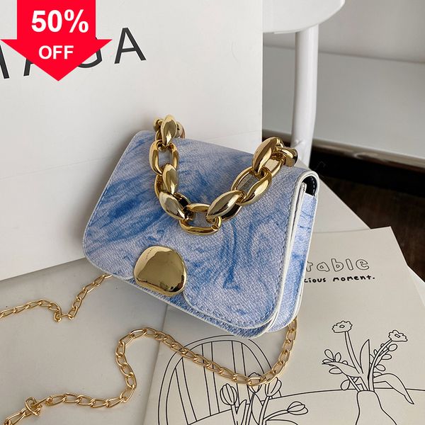 designer evening bag new shoulder mini hand fashion small women's simple style personalized lock portable msenger bag
designer evening bag new shoulder mini hand fashion small women's simple style personalized lock portable msenger bag