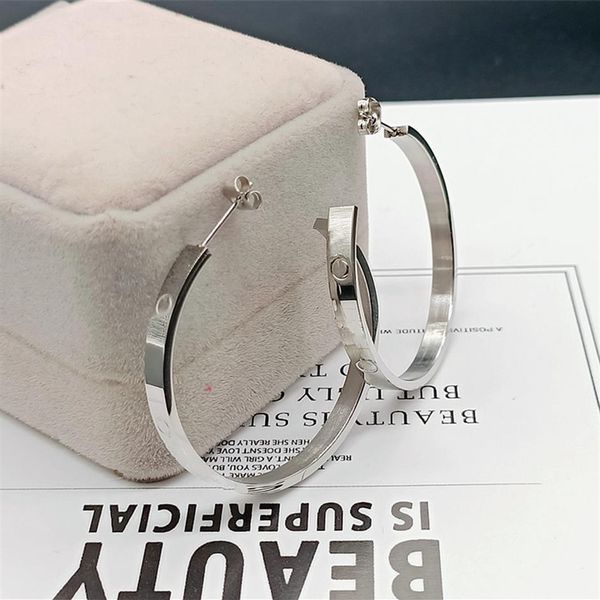 gold silver hoop charm earrings women european and american style designer letter c luxury screw pattern classic wedding anniversa269b, Golden
gold silver hoop charm earrings women european and american style designer letter c luxury screw pattern classic wedding anniversa269b, Golden