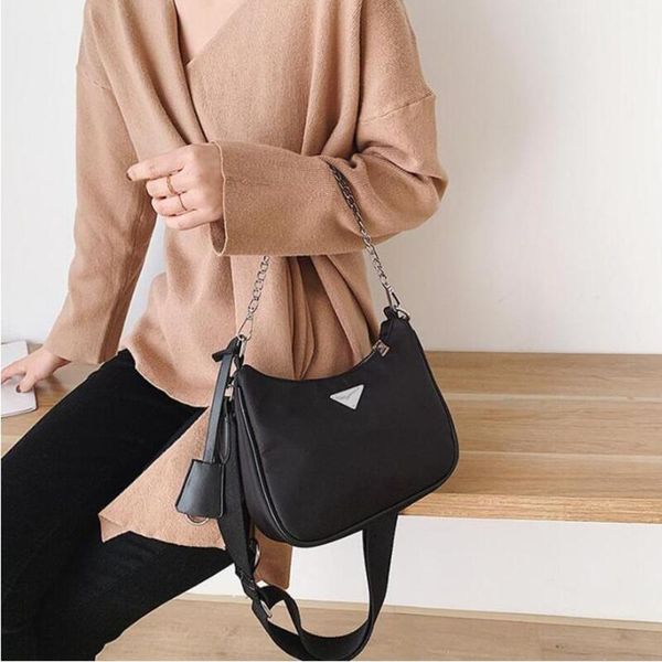 luxury designer handbag nylon messenger bag classic three-piece suit ladies underarm shoulder wallet fashion retro star 118 frame
luxury designer handbag nylon messenger bag classic three-piece suit ladies underarm shoulder wallet fashion retro star 118 frame