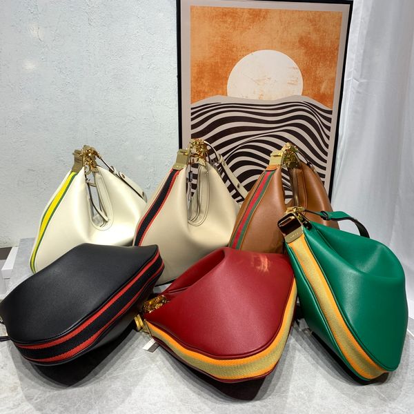 attache large shoulder bag multi color dumpling bun canvas crescent moon g shaped hook closure ebony web trim additional leather strap desig
attache large shoulder bag multi color dumpling bun canvas crescent moon g shaped hook closure ebony web trim additional leather strap desig