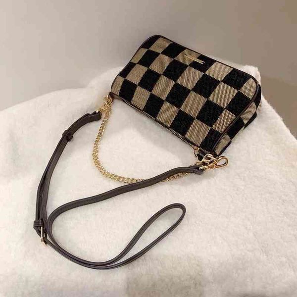 evening bags women s bag 2022 new simple checkerboard armpit shoulder ocean plaid canvas collection portable chain 220922
evening bags women s bag 2022 new simple checkerboard armpit shoulder ocean plaid canvas collection portable chain 220922