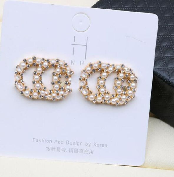 18k gold plated brand designer letter stud geometric famous women crystal rhinestone pearl earring wedding party jewelry mixed random send, Golden;silver
18k gold plated brand designer letter stud geometric famous women crystal rhinestone pearl earring wedding party jewelry mixed random send, Golden;silver