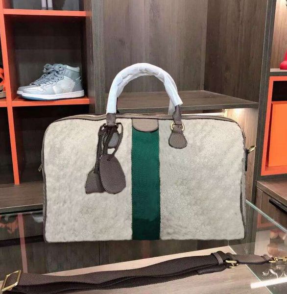 2022 duffle bags 45 cm women travel bag men classic duffel rolling softsided suitcase hand luggage set handbag tote frame
2022 duffle bags 45 cm women travel bag men classic duffel rolling softsided suitcase hand luggage set handbag tote frame
