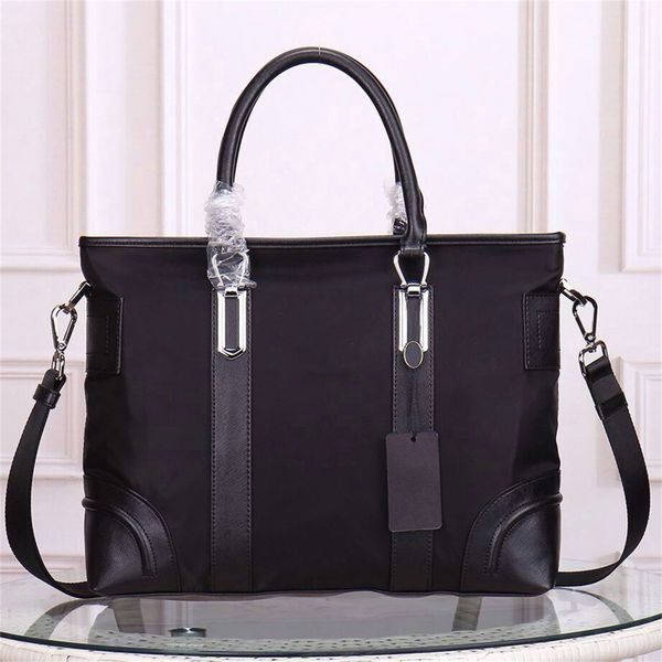 re nylon saffiano leather briefcase work bags tote enameled metal triangle logo print nylon lining adjustable shoulder strap name tag crossb
re nylon saffiano leather briefcase work bags tote enameled metal triangle logo print nylon lining adjustable shoulder strap name tag crossb