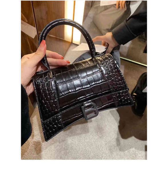 designers handag lady's hourglass balencigabag bag fashion leather crocodile senior net red versatile one shou
designers handag lady's hourglass balencigabag bag fashion leather crocodile senior net red versatile one shou