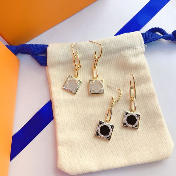 stud stainless steel women designer double letter luxury geometric crystal heart-shaped couple earrings for lady party wedding, Golden;silver
stud stainless steel women designer double letter luxury geometric crystal heart-shaped couple earrings for lady party wedding, Golden;silver