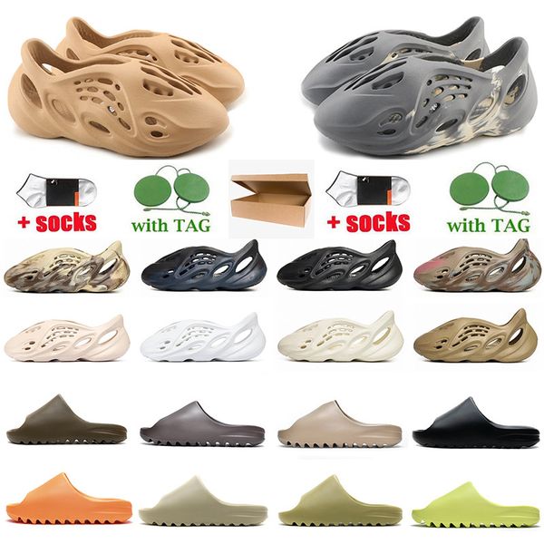 2022 quality designer slipper sandals men women sandal camo triple black white resin pattern slippers foam runners west slipper shoes with b
2022 quality designer slipper sandals men women sandal camo triple black white resin pattern slippers foam runners west slipper shoes with b