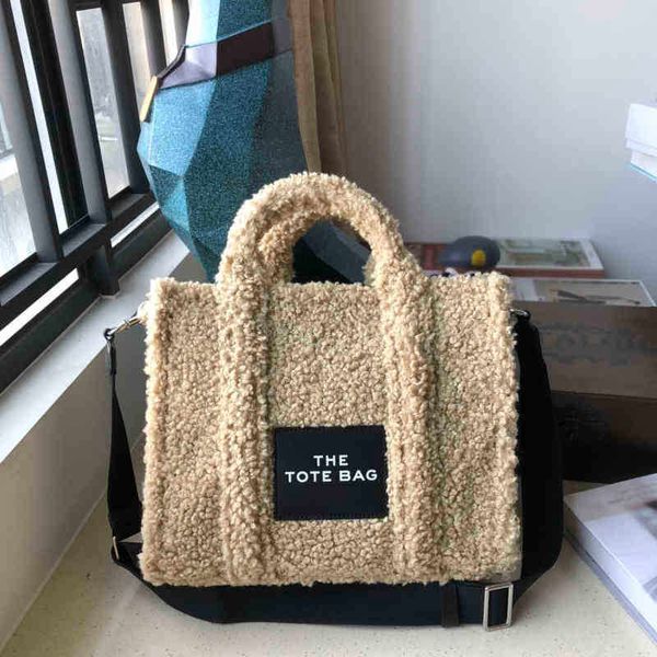 designer luxury women the tote bag fashion versatile handbags shoulder crossbody bags purse tories totes large capacity saddle wallets 7a go 
designer luxury women the tote bag fashion versatile handbags shoulder crossbody bags purse tories totes large capacity saddle wallets 7a go