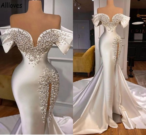 luxury pearls crystal mermaid wedding dresses with long sleeves off shoulder vintage satin bridal gowns arabic aso ebi split second receptio, White
luxury pearls crystal mermaid wedding dresses with long sleeves off shoulder vintage satin bridal gowns arabic aso ebi split second receptio, White
