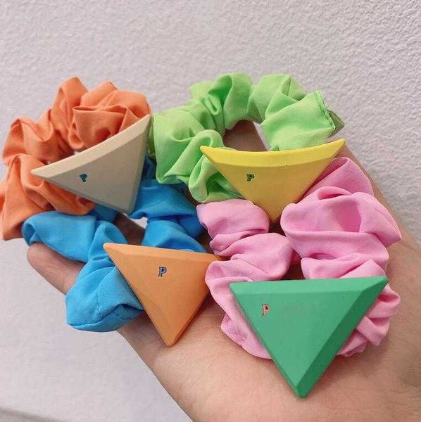 fashion triangle letter head rope candy color sweet hair rope rubber for women girls designer elastic large intestine circle, Pink
fashion triangle letter head rope candy color sweet hair rope rubber for women girls designer elastic large intestine circle, Pink