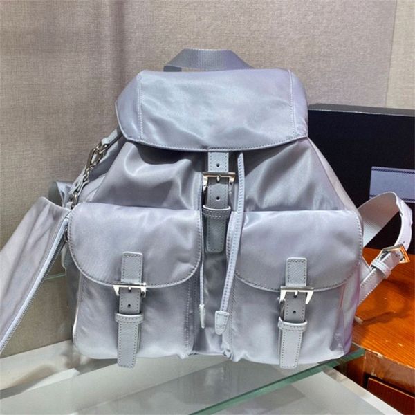re-nylon medium backpack saffiano details adjustable woven nylon straps handle zipper pouch enameled metal triangle logo drawstring closure
re-nylon medium backpack saffiano details adjustable woven nylon straps handle zipper pouch enameled metal triangle logo drawstring closure