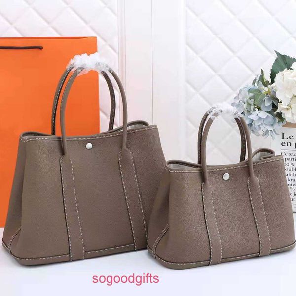 garden party bags women crossbody herme designer tote handbags high order wax thread leather women's bag togo garden tot portabl
garden party bags women crossbody herme designer tote handbags high order wax thread leather women's bag togo garden tot portabl