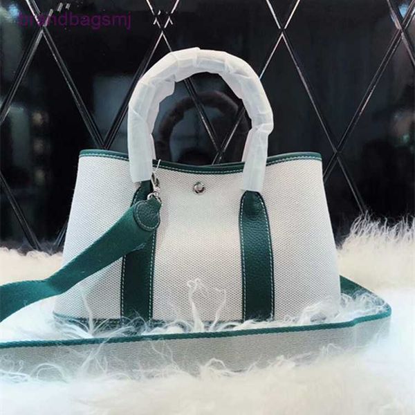 bag herme new women's bag fashion garden bag canvas with leather portable single shoulder messenger shoulder strap
bag herme new women's bag fashion garden bag canvas with leather portable single shoulder messenger shoulder strap