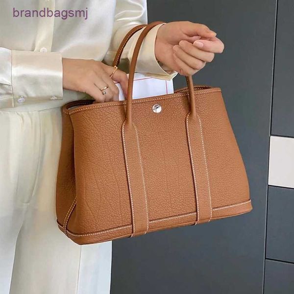 bag herme classic mommy garden light luxury litchi pattern bucket women's cow leather oblique straddle handbag
bag herme classic mommy garden light luxury litchi pattern bucket women's cow leather oblique straddle handbag