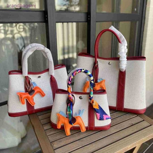 bag herme 2021 summer new canvas with layer cowhide garden bag color contrast fashion hand matching versatile messenger
bag herme 2021 summer new canvas with layer cowhide garden bag color contrast fashion hand matching versatile messenger