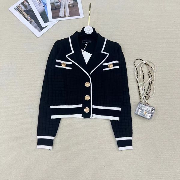 909 l 2022 milan runway autumn women's sweater brand same style long sleeve lapel neck cardigan womens qianli, White;black
909 l 2022 milan runway autumn women's sweater brand same style long sleeve lapel neck cardigan womens qianli, White;black