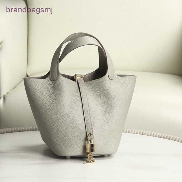 bags herme compared with high-end h-button food basket bucket bag pure manual togo leather picotin handbag female
bags herme compared with high-end h-button food basket bucket bag pure manual togo leather picotin handbag female