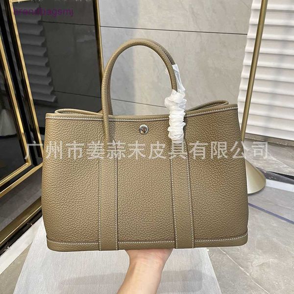 bag herme high version h home garden bag real leather women's one shoulder diagonal cross tote portable shopping bucket
bag herme high version h home garden bag real leather women's one shoulder diagonal cross tote portable shopping bucket