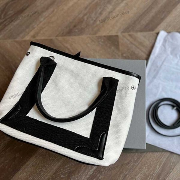 shoulder totes bag canvas tote designer quality crossbody classic black and white for women famous brand shopping purses 220302
shoulder totes bag canvas tote designer quality crossbody classic black and white for women famous brand shopping purses 220302