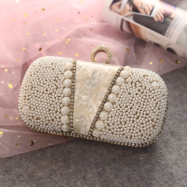 fashion and elegant atmosphere pearl evening bag glossy bright feel comfortable banquet evening bags
fashion and elegant atmosphere pearl evening bag glossy bright feel comfortable banquet evening bags