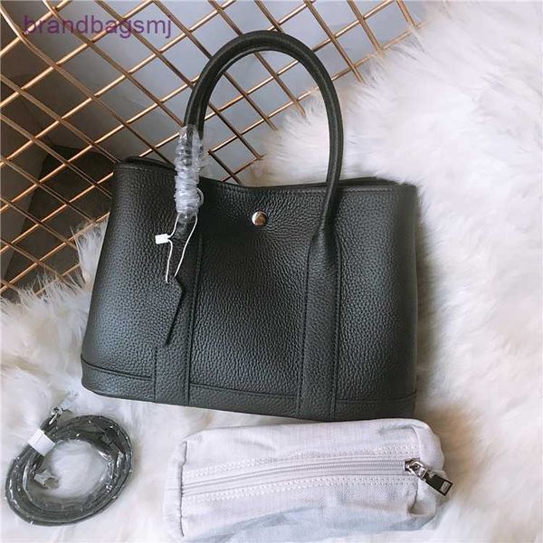 bag herme leather women's bag garden lychee grain leather with adjustable shoulder strap
bag herme leather women's bag garden lychee grain leather with adjustable shoulder strap