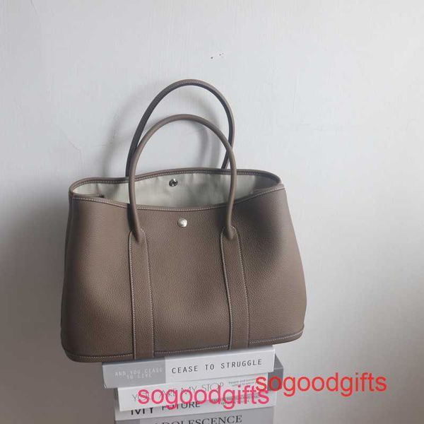 garden party bags women crossbody herme designer tote handbags partial shape ol real leather bag can hold 14 inch computer and f
garden party bags women crossbody herme designer tote handbags partial shape ol real leather bag can hold 14 inch computer and f