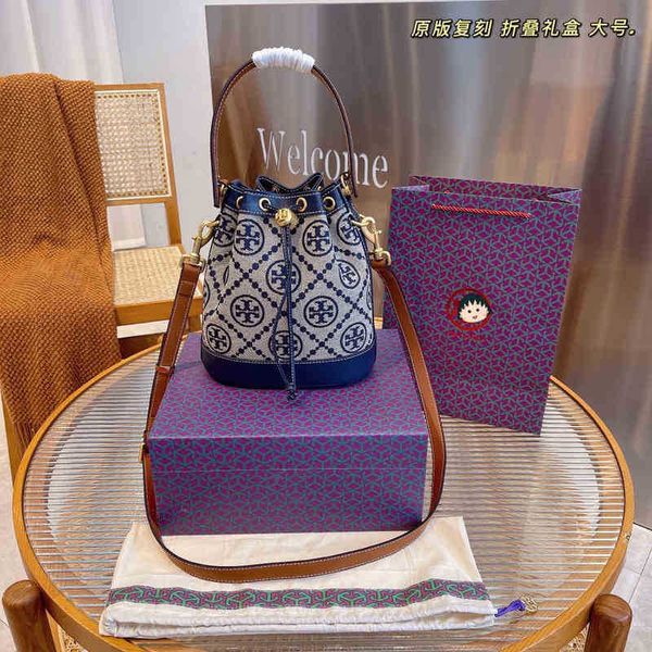 designer burchs torys handbags 2022 korean version of little red book same style printed temperament bucket bag portable schoolgirl shoulder
designer burchs torys handbags 2022 korean version of little red book same style printed temperament bucket bag portable schoolgirl shoulder