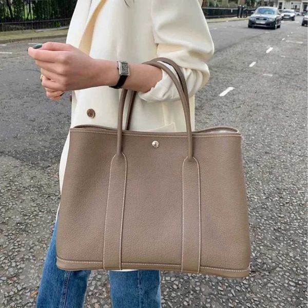 herme handbags quality cowhide leather garden bag women's large capacity wedding one shoulder portable tote wm
herme handbags quality cowhide leather garden bag women's large capacity wedding one shoulder portable tote wm