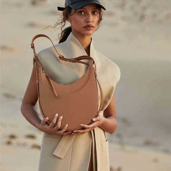 crescent moon armpit leather bag female spring and summer fashion bags french minority designer
crescent moon armpit leather bag female spring and summer fashion bags french minority designer