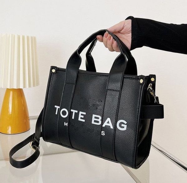 2023 marc the tote bag single shoulder handbag large capacity crossbody bags genuine leather fashion letter prints square shopping handbags
2023 marc the tote bag single shoulder handbag large capacity crossbody bags genuine leather fashion letter prints square shopping handbags