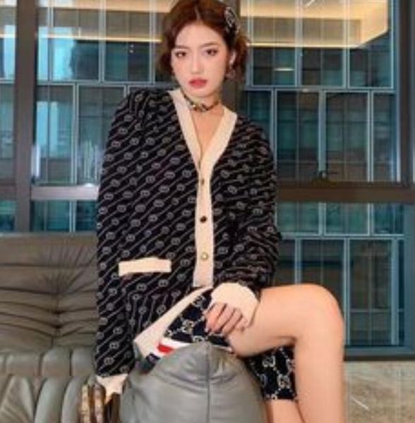 women's sweater luxury ggity jacket cardigan v-neck loose striped sweater ladies trench coat, White;black
women's sweater luxury ggity jacket cardigan v-neck loose striped sweater ladies trench coat, White;black