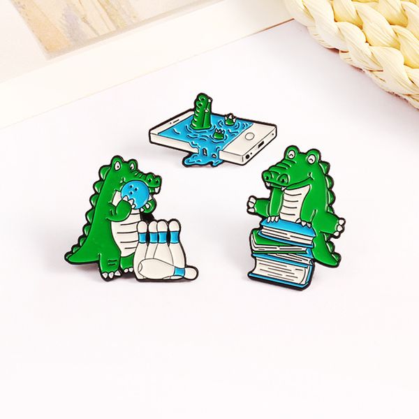 cartoon cute green dinosaur brooches set 3 pcs play bowling phone games read book alloy animal badge pin for children, Gray
cartoon cute green dinosaur brooches set 3 pcs play bowling phone games read book alloy animal badge pin for children, Gray