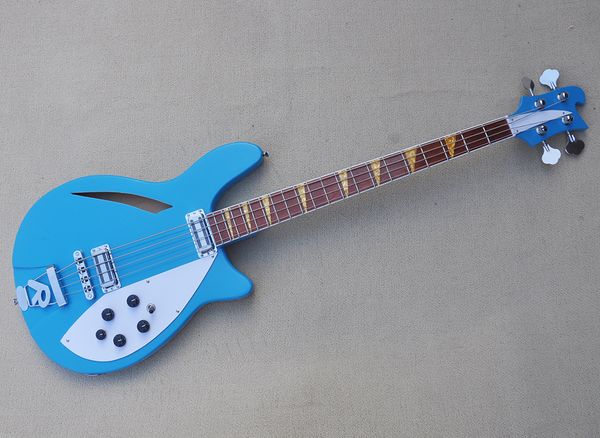 blue semi-hollow 4 strings electric bass guitar with rosewood fretboard 
blue semi-hollow 4 strings electric bass guitar with rosewood fretboard
