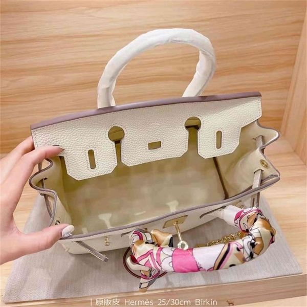 2021 designer herme birkins bags women new pure leather flip handbag platinum fahion atmophere trend houlder bag have logo
2021 designer herme birkins bags women new pure leather flip handbag platinum fahion atmophere trend houlder bag have logo